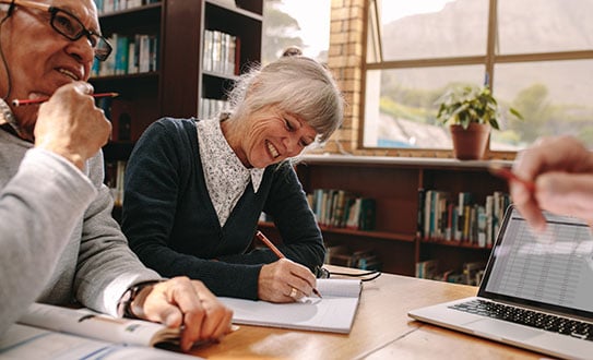 woman-at-desk-with-paper